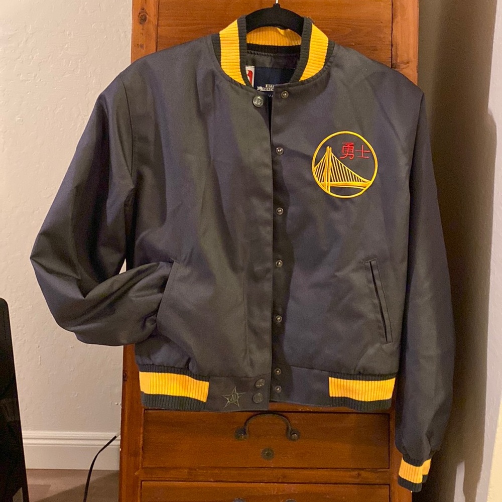 Warriors women’s bomber jacket size medium.